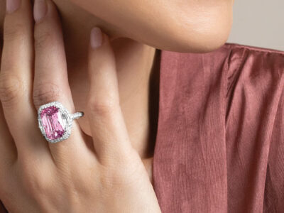 Pink diamond ring on woman's hand