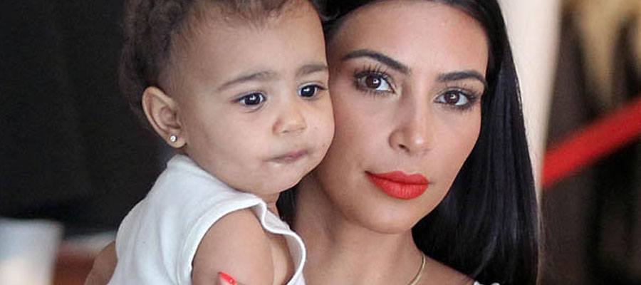 Blog-young-jewelry Kim Kardashian holding her baby North