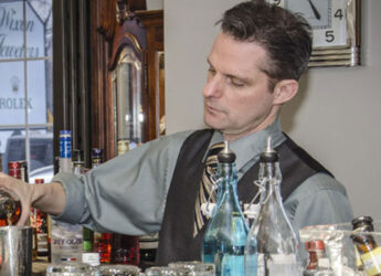 Christopher Green mixing a cocktail