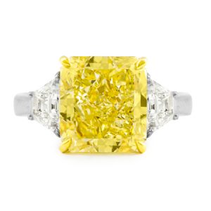 Vivid yellow three stone diamond ring