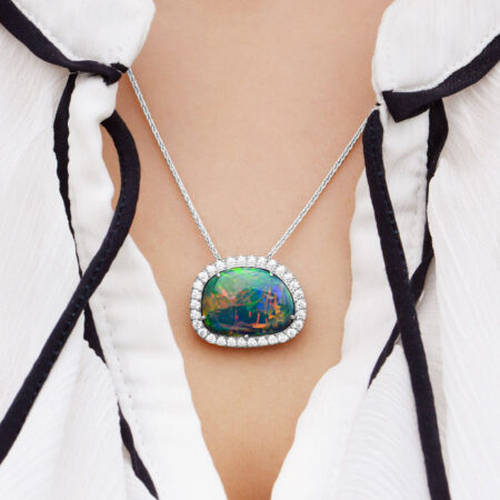 Chinese writing black opal pendant around neck