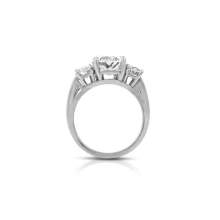 Three-Stone Oval Diamond Ring