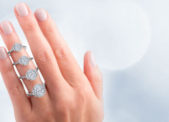 Hand with 4 rings on finger