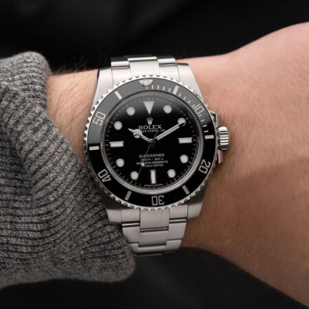 Rolex Submariner (114060) on wrist