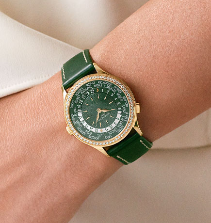 Patek Philippe Ladies World Time watch on woman's wrist